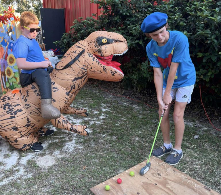 Children playing mini golf